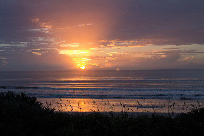 Watch the sunrise from your oceanfront balcony.